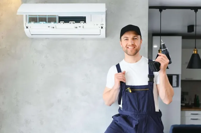 Smiling Young Male Electrician Repair Conditioner Client Home Man Mechanic Repairman Fix Filters Air Condition Device Customer House X - Residential Air Conditioning Systems Mechanic Certification study guide