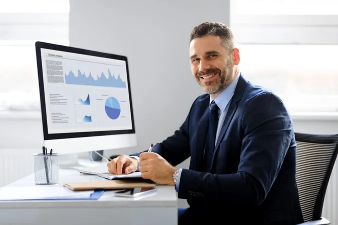 Portrait Happy Businessman Working Computer Office Smiling Camera Monitor With Graphics Charts X - Agile Analysis Certification study guide