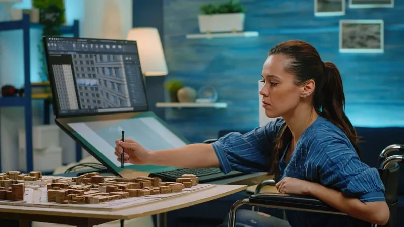 Invalid Engineer Looking Building Model Computer Designing Layout Blueprint Construction Architect Wheelchair Using Touch Screen Monitor Analyze Architectural Structure X - Autodesk Certified Expert study guide