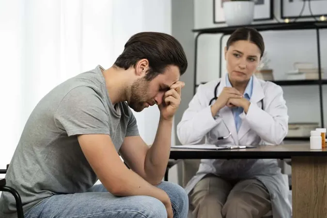 Side View Sad Man Doctor S Appointment X - Board Certified Addiction Medicine Specialist study guide