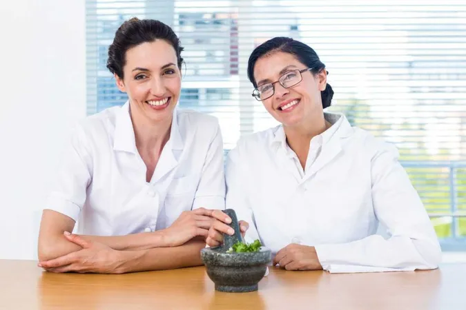Scientists Mixing Herbs With Pestle Mortar X - Ayurvedic Practitioner study guide