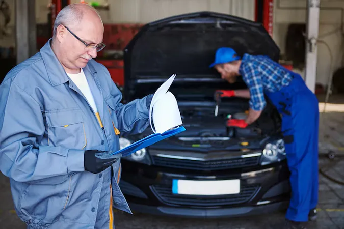 Mechanics Repairing Car Workshop - Certified Automotive Appraisal and Damage Estimator study guide
