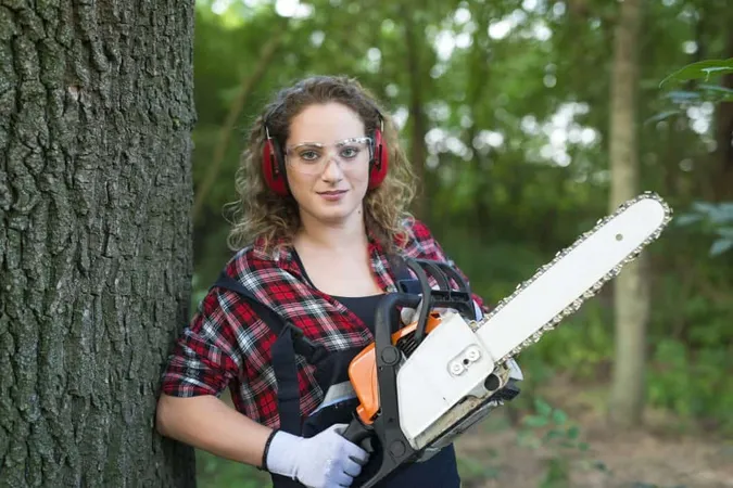 Professional Lumberjack Forest Cutting Oak Trunk With Chainsaw X - Certified Arborist Tree Service of Albuquerque study guide