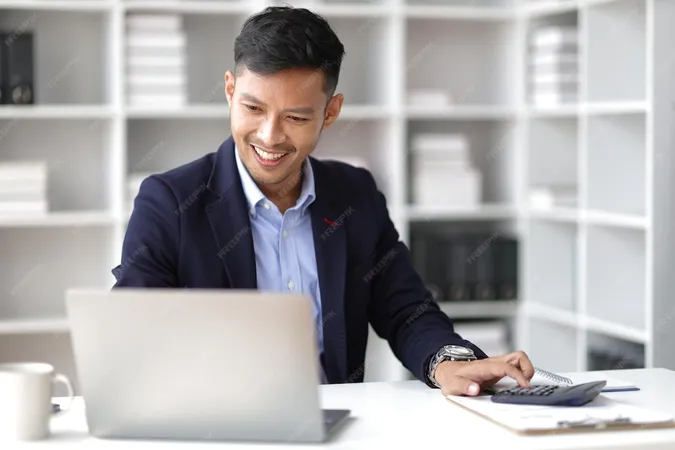 Businessman Working With Laptop Desk Office - Certified Credit Manager study guide