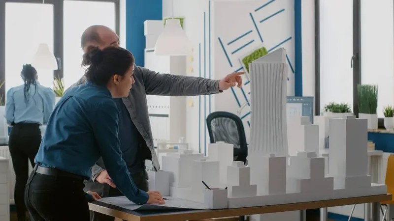 Side View Business Colleagues Working Office X - Certified Enterprise Architect study guide