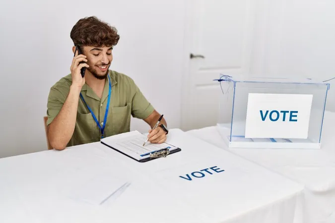 Young Arab Man Smiling Confident Talking Smartphone Electoral College X - Certified Elections Registration Administrator study guide