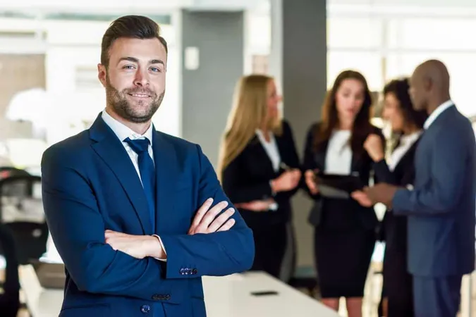 Businessman Leader Modern Office With Businesspeople Working X - Certified Leadership Coach study guide
