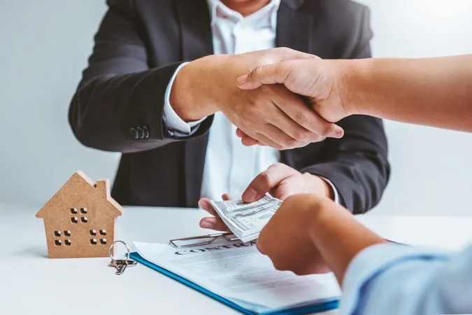 Midsection Man Holding Hands Table X - Certified Mortgage Banker study guide