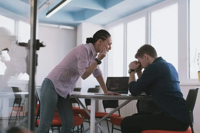 Emotional Couple Young Colleagues Arguing Modern Bright Open Space Office Business Woman Shouting Her Sad Man Assistant Meeting Room Copy Space Side View High Quality Pho X - Certified Specialist in Anger Management study guide
