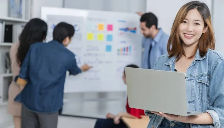 Smart Asian Startup Small Entrepreneur Standing Confident Portrait With Friends Partner Casual Meeting Brainstorm With White Board Business Financce Paper Chart Anslysis Office Background 1 X - Certified Scrum Trainer study guide
