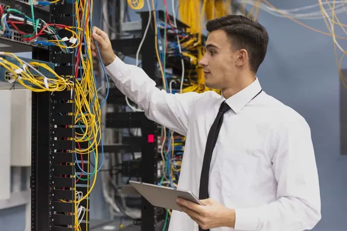 Young Business Engineer With Tablet Medium Shot X - Certified Telecommunications Executive study guide
