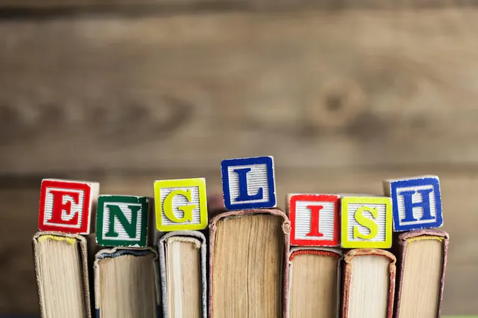Stack Books With English Word Background - English Language Arts and Reading study guide