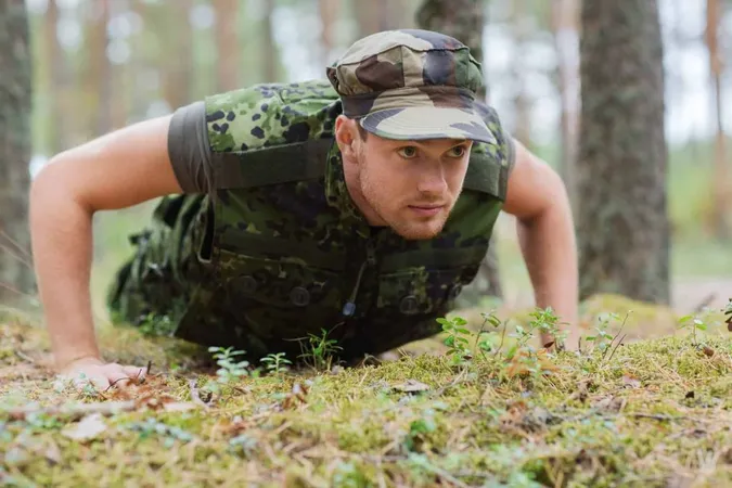 War Army Training People Concept Young Soldier Ranger Wearing Military Uniform Doing Push Ups Forest X - Fitness Test for Ontario Correctional Officer Applicants study guide