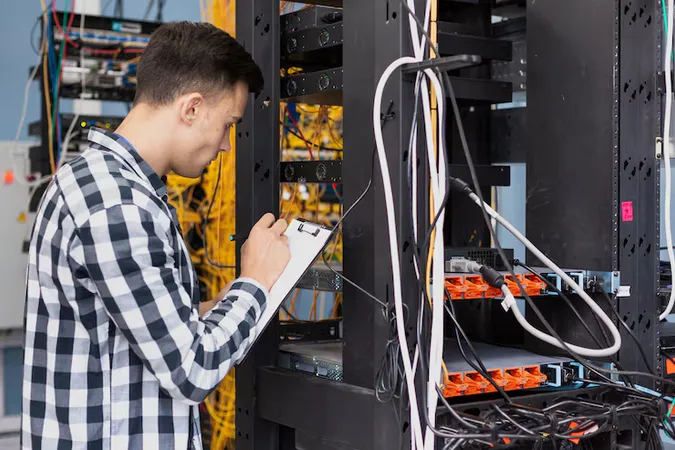 Young Engineer Writing Clipboard Medium Shot 23 - Interconnecting Cisco Networking Devices Part 1 study guide