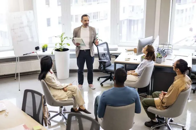 Medium Shot Colleagues Learning Job X - Leadership and Performance Coaching Certification study guide