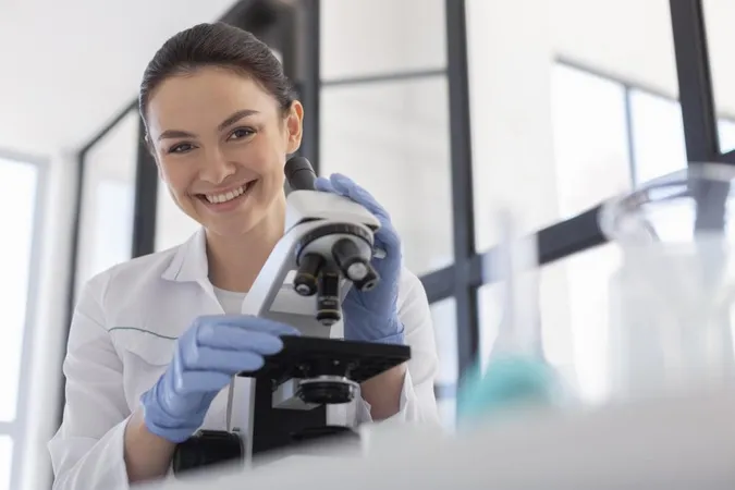 Medium Shot Scientist Working With Microscope X - Medical Laboratory Scientist study guide