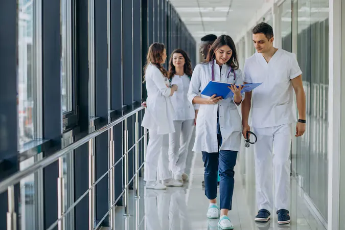 Team Young Specialist Doctors Standing Corridor Hospital - National Healthcareer Institute Certification study guide